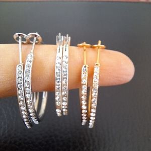 Never worn 3 sets of rhinestone hoop earrings